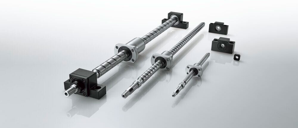 Image of Model SDA-VZ ball screws with finished shaft ends alongside support units for low shaft centers