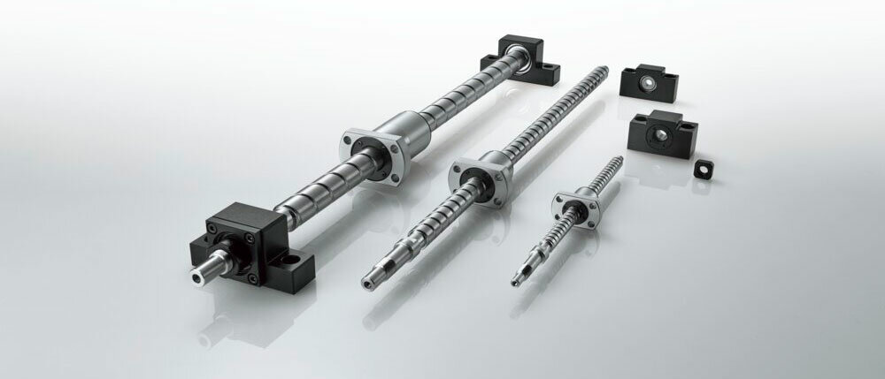  Image of Model SDA-VZ ball screws with finished shaft ends alongside support units for low shaft centers