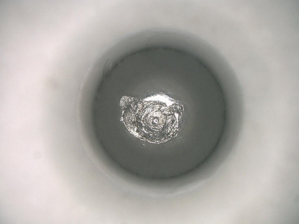 Flaking on an LM Guide's rolling element (ball)